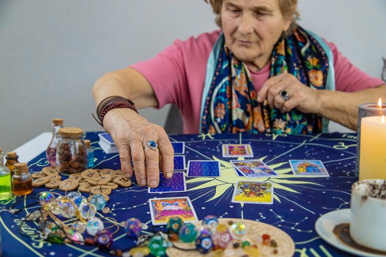 Fortune teller reads tarot cards. selective focus. Old.